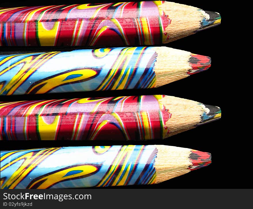 A background of colorful pencils, with colorful tips.