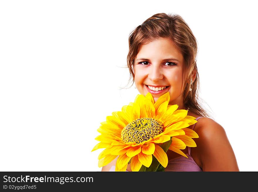 Portrait of a charming woman in dress with sunflower