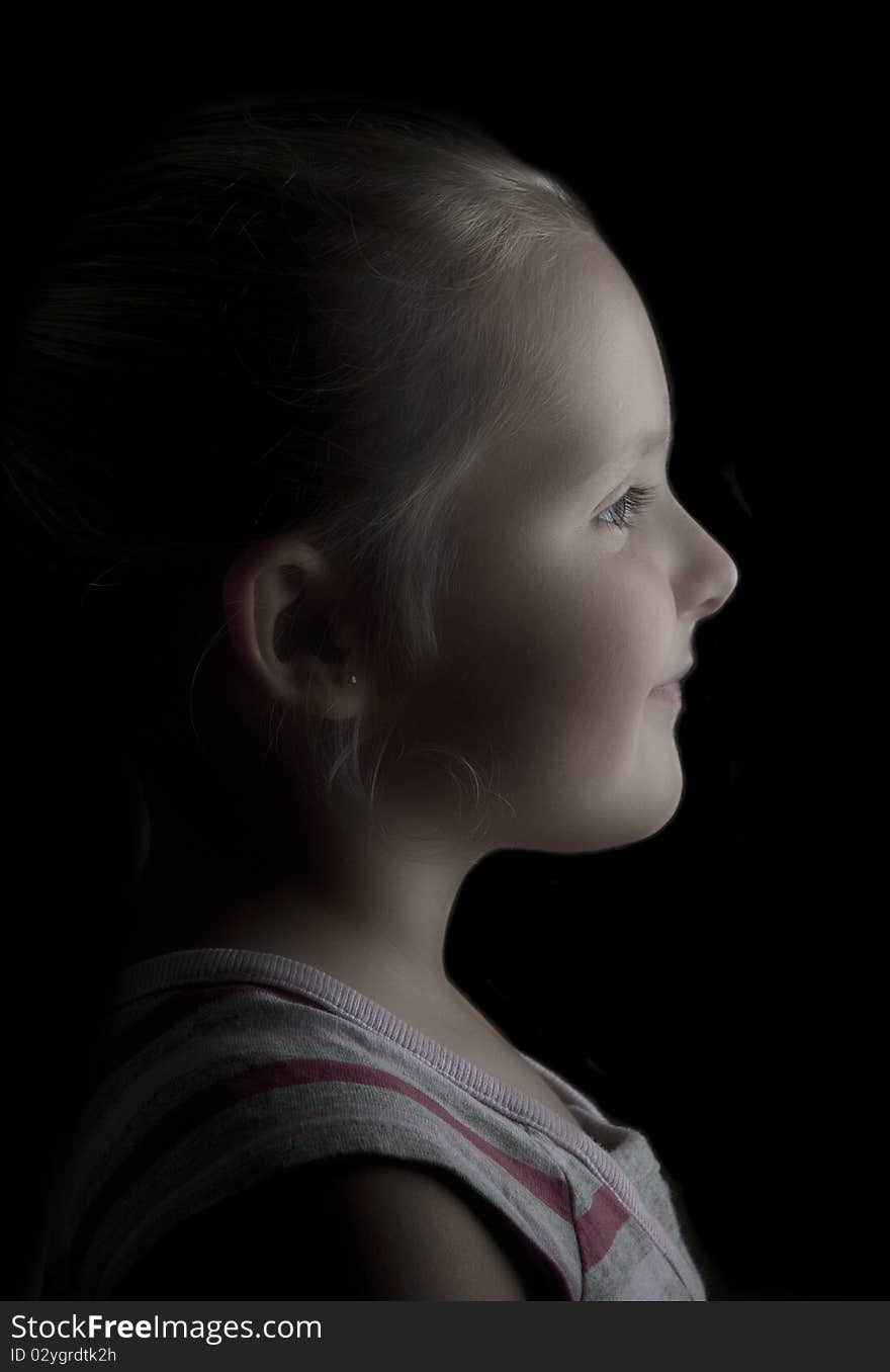 Side portrait of a young girl