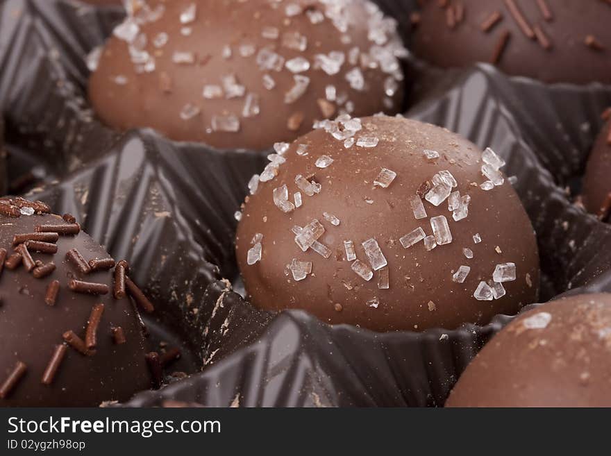 Truffle candy coated chocolate with decorative powdered for the occasion.