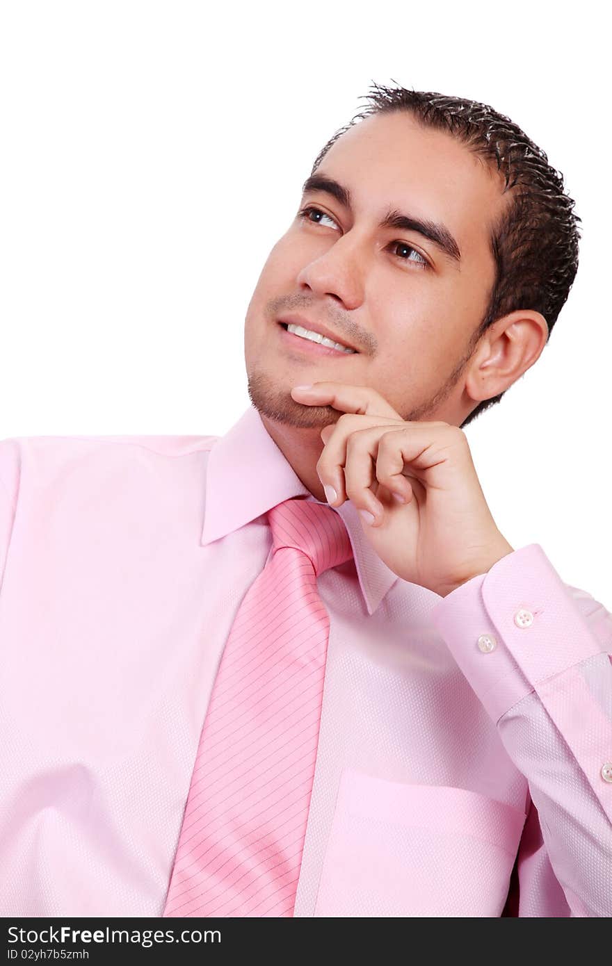 Young businessman thinking and looking up, isolated on white