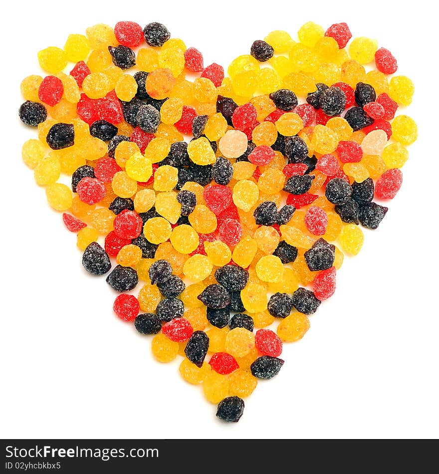 Beautiful sweet candies in heart shape isolated on a white background.