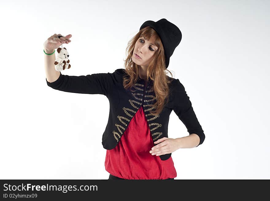 Masked blonde girl posing on white background