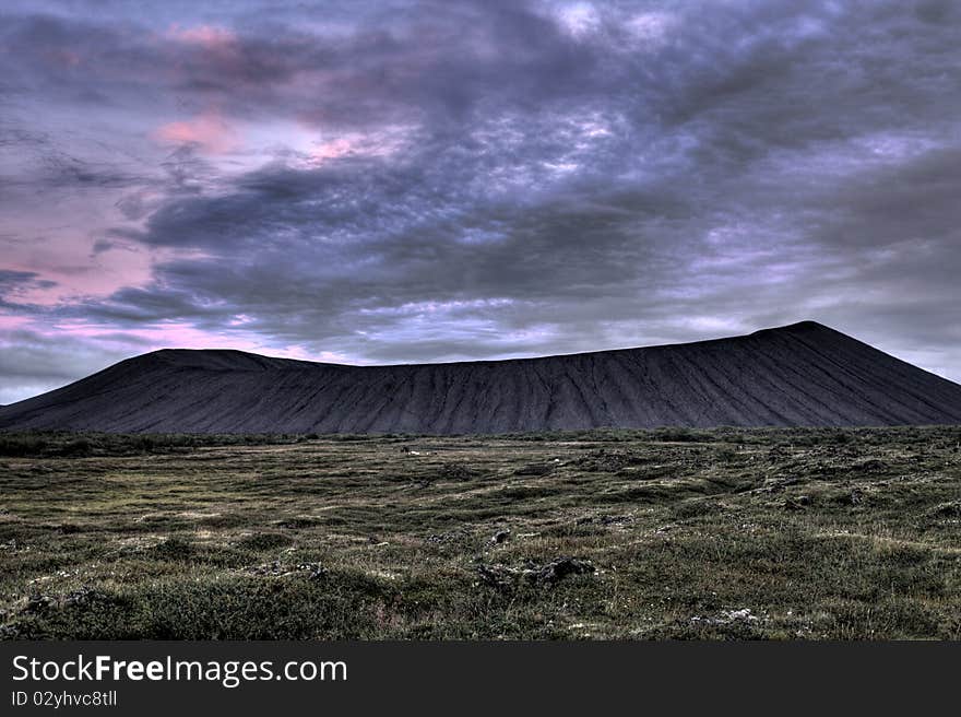 Old dormant vulcano at purple sunset. Old dormant vulcano at purple sunset