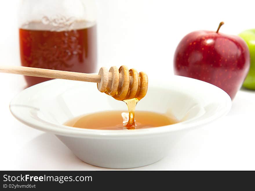 Plate With The Fresh Honey And Apples