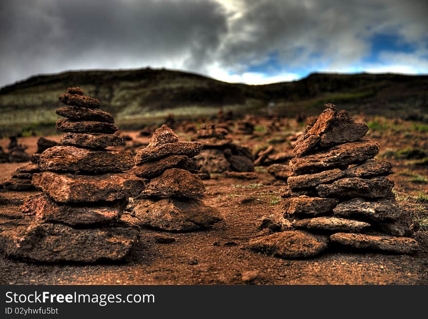 Piled stones in a row. Piled stones in a row