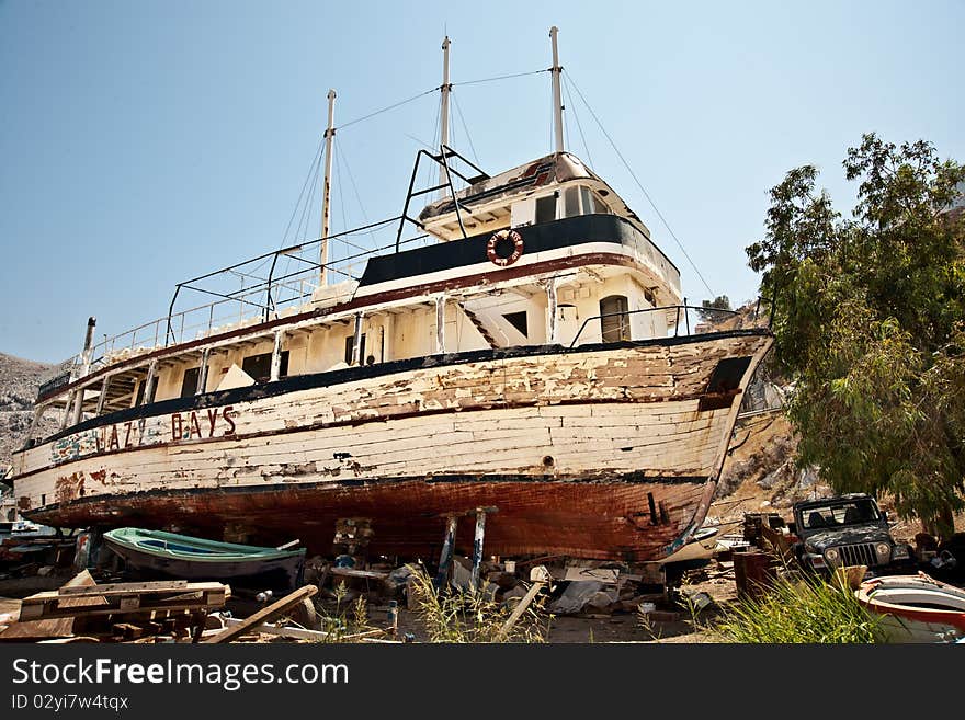 Old boat on a cemetery of the ships