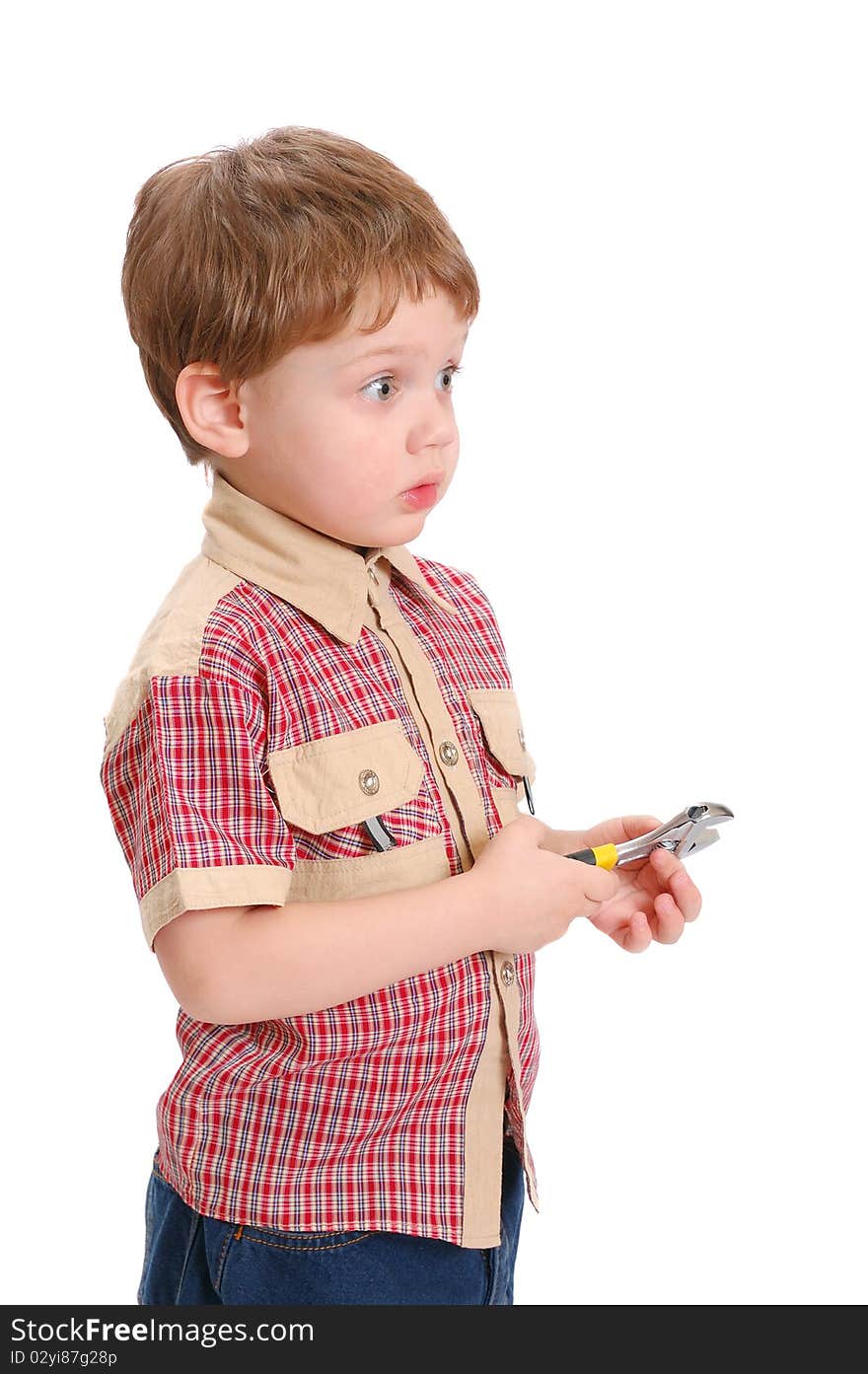 The little boy with a wrench on a white background