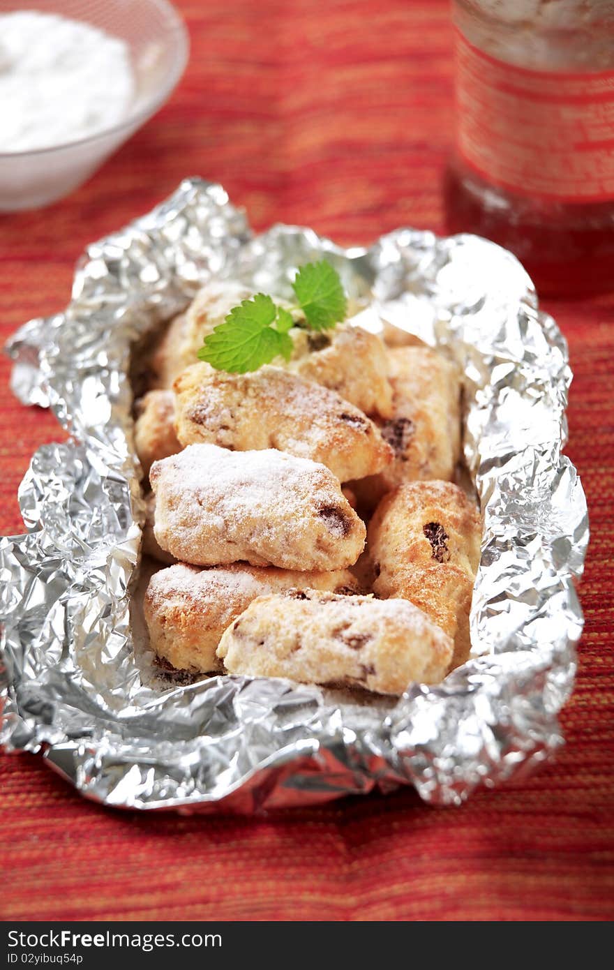 Mini Christmas stollen cakes in aluminum foil