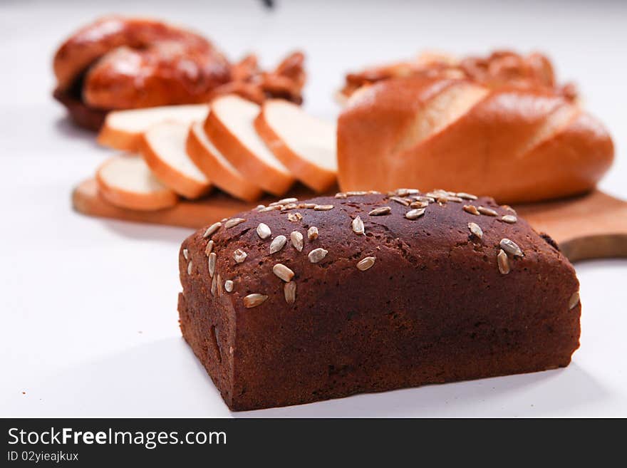 Picture of different bread isolated at white background. Picture of different bread isolated at white background