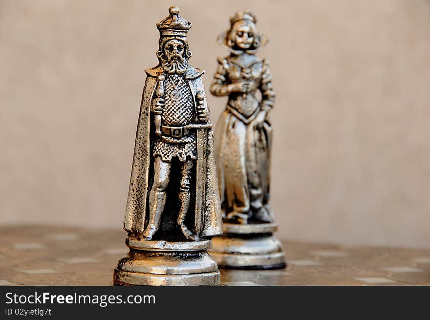 king and queen on chessboard