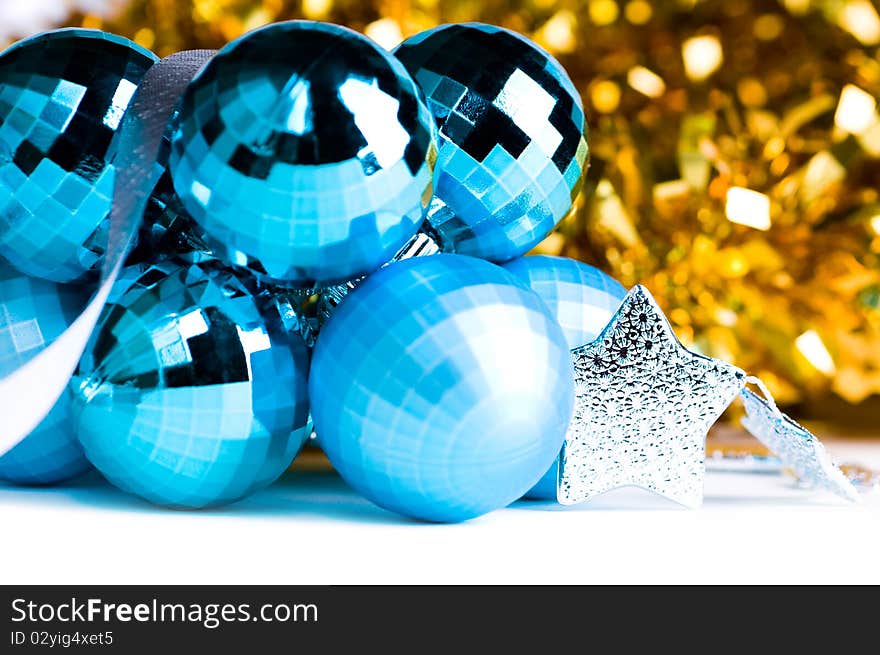 Colorful Christmas baubles and silver stars