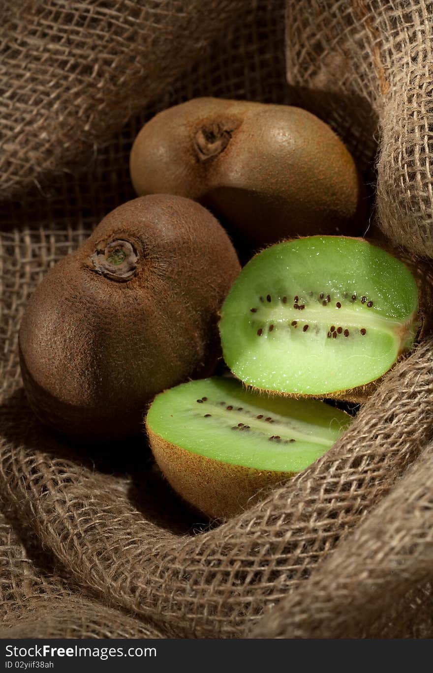 Kiwi fruit on the burlap textile still life