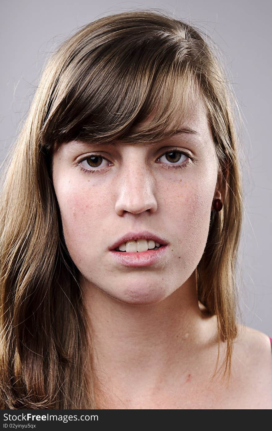 Beautiful portrait or a young brunette girl in studio. Beautiful portrait or a young brunette girl in studio