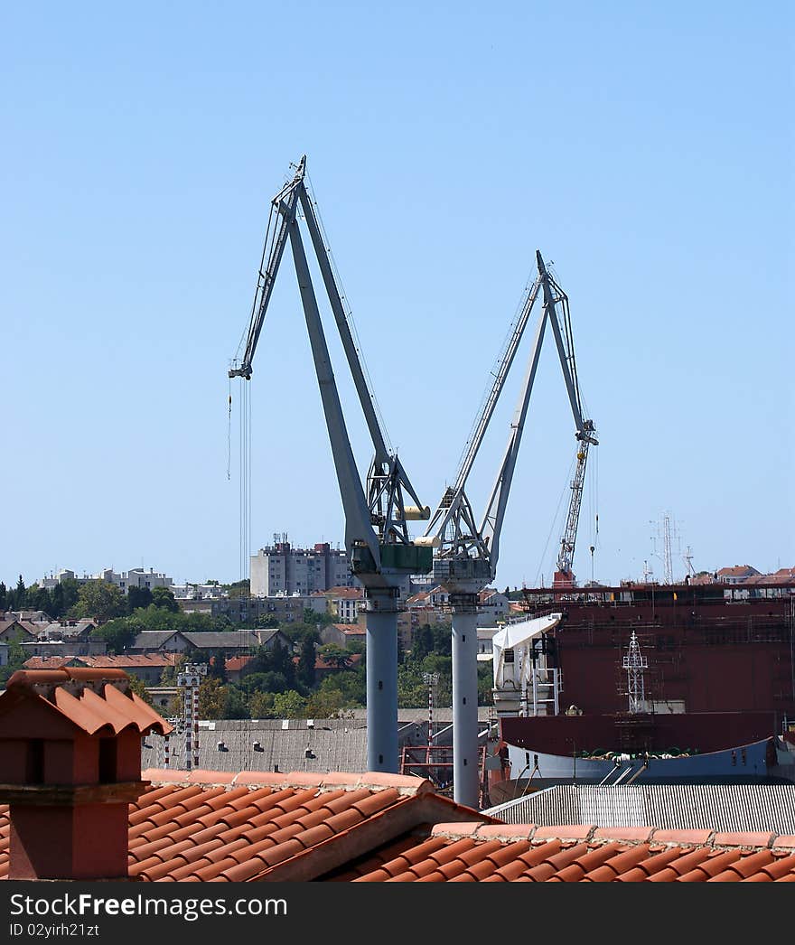 Marine cargo port. Cranes. Pula, Croatia. Marine cargo port. Cranes. Pula, Croatia