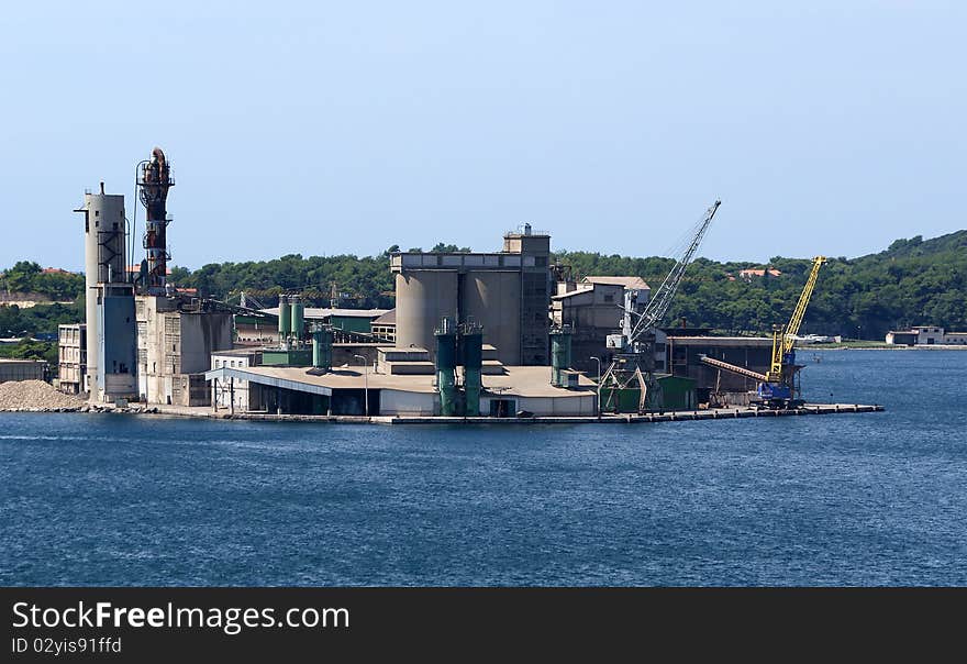 Marine cargo port. Cranes. Pula, Croatia