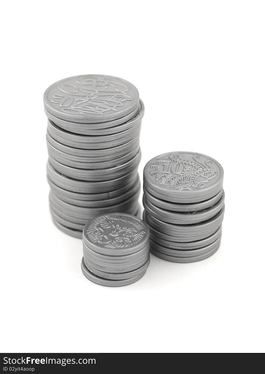 Silver play money isolated against a white background