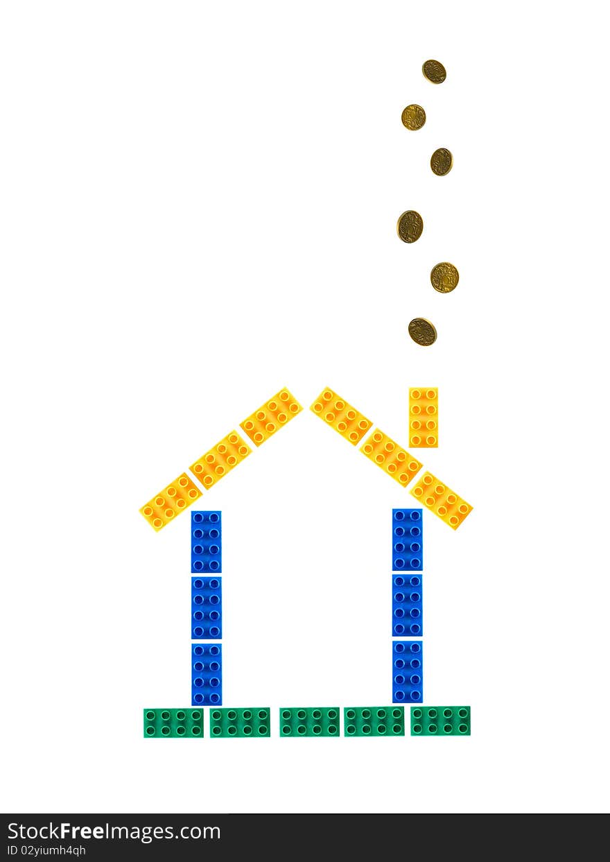 A house assembled from toy building blocks. A house assembled from toy building blocks