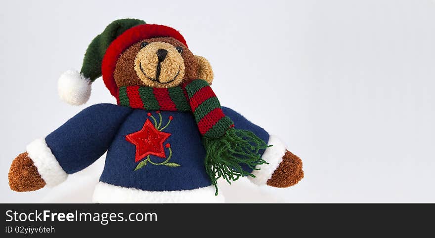 Isolated teddy bear dressed for christmas. Isolated teddy bear dressed for christmas