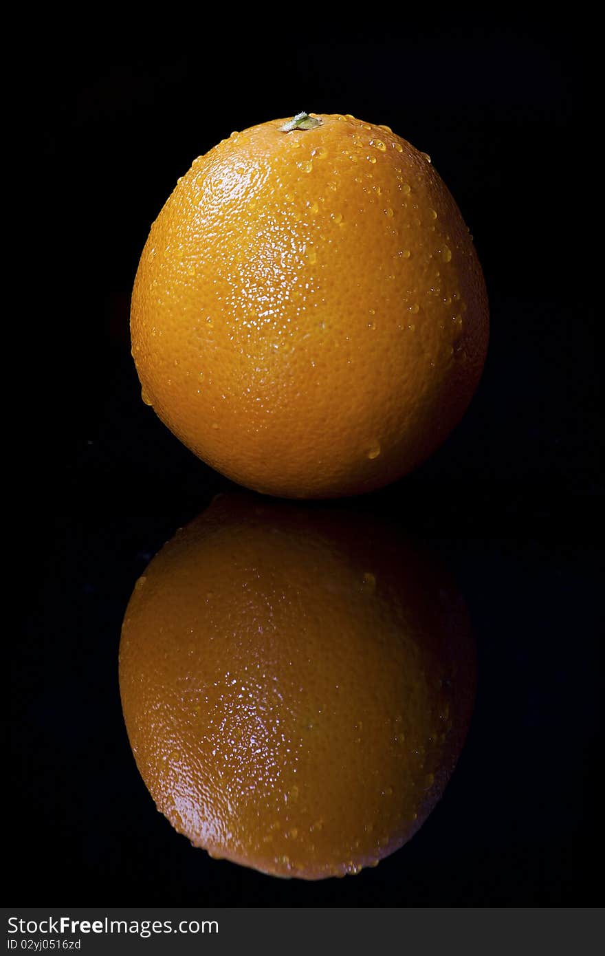 Fresh Orange With Water Drops