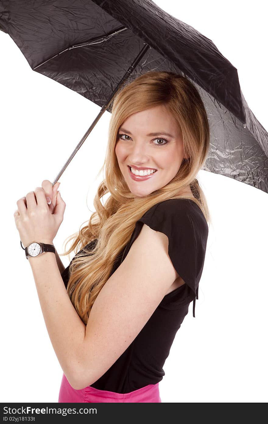 A close up of a woman in a pink skirt holding an umbrella. A close up of a woman in a pink skirt holding an umbrella.