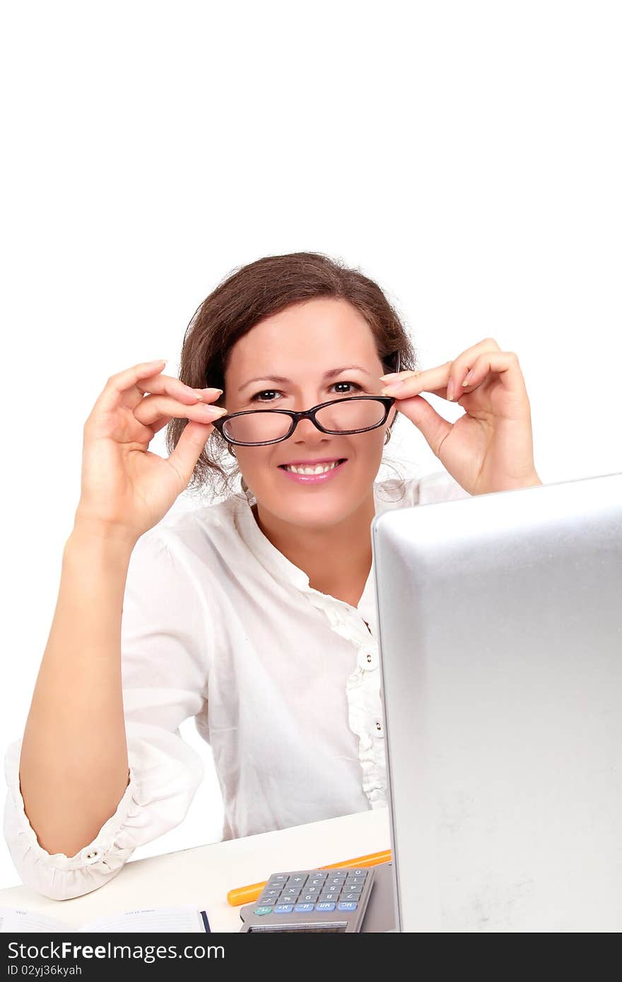 Happy businesswoman on a workplace, closed-up portrait. Happy businesswoman on a workplace, closed-up portrait