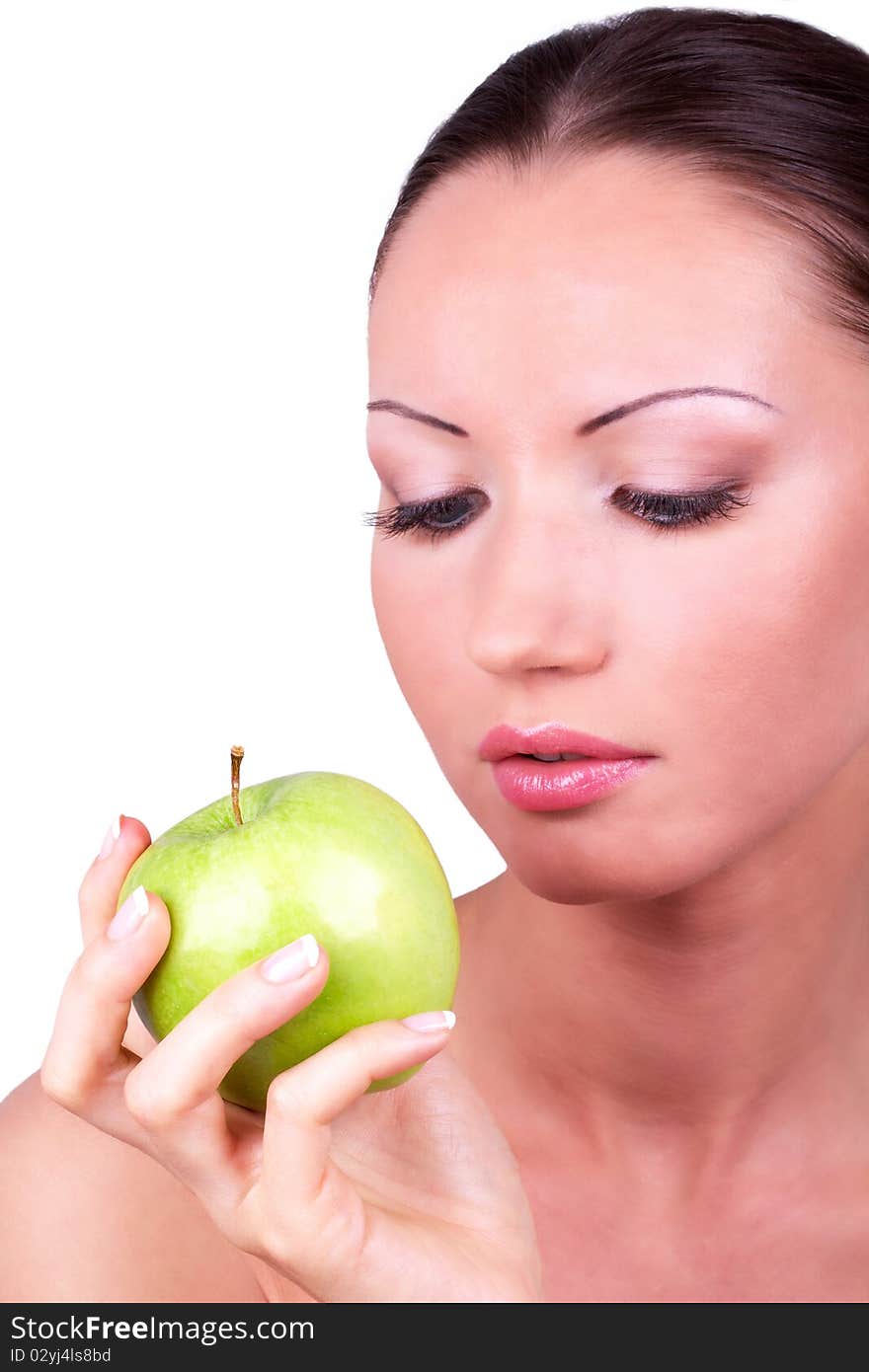 Woman Looking At Green Apple In Hand