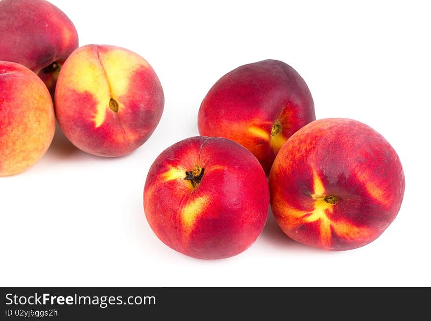 Peaches, closed-up on white