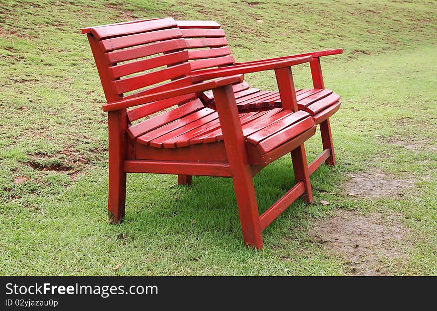 Two red chair on the yard. Two red chair on the yard