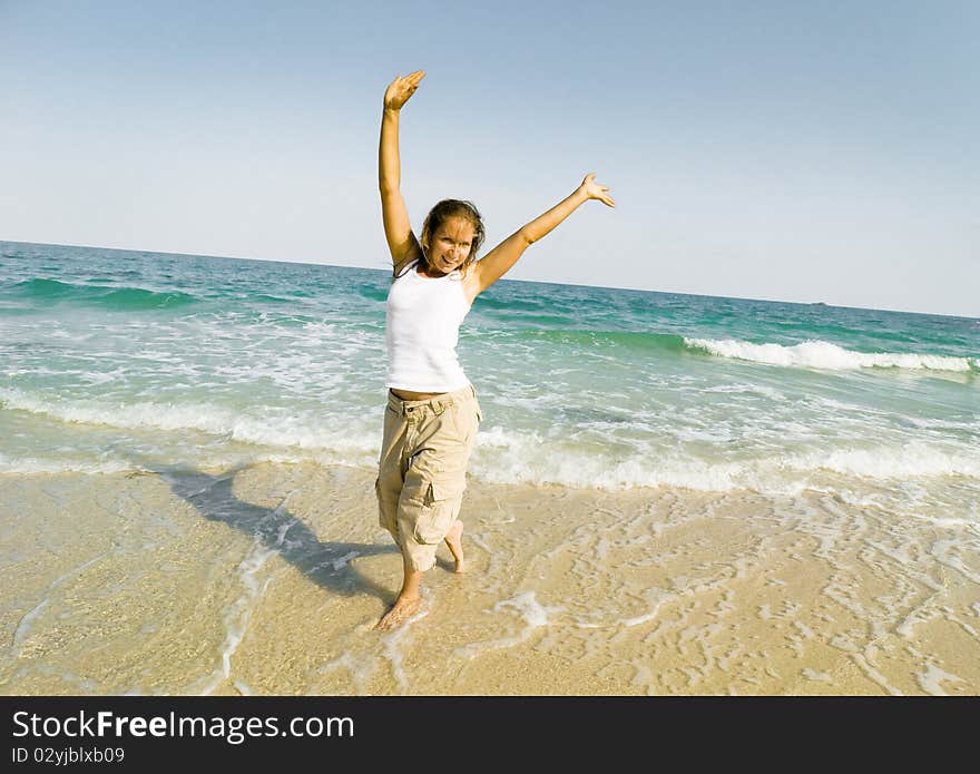 Woman running at the beach. Woman running at the beach