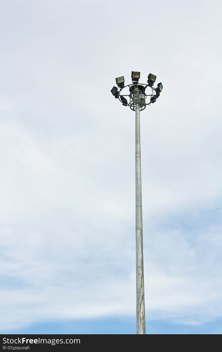 Steel sport light tower in sky background