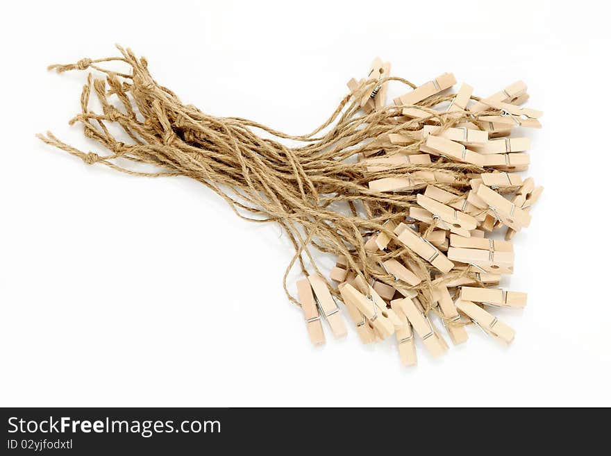 Wooded clothespins isolated on white background