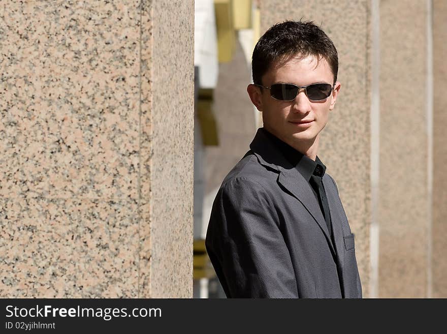 Young businessman in sunglasses