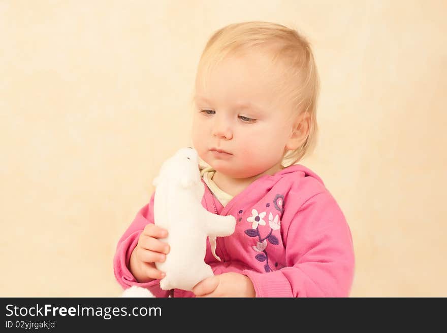 Adorable Toddler Girl Sit On Bed Hold Polar Bear