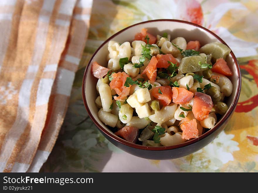 Macaroni salad with red  fish