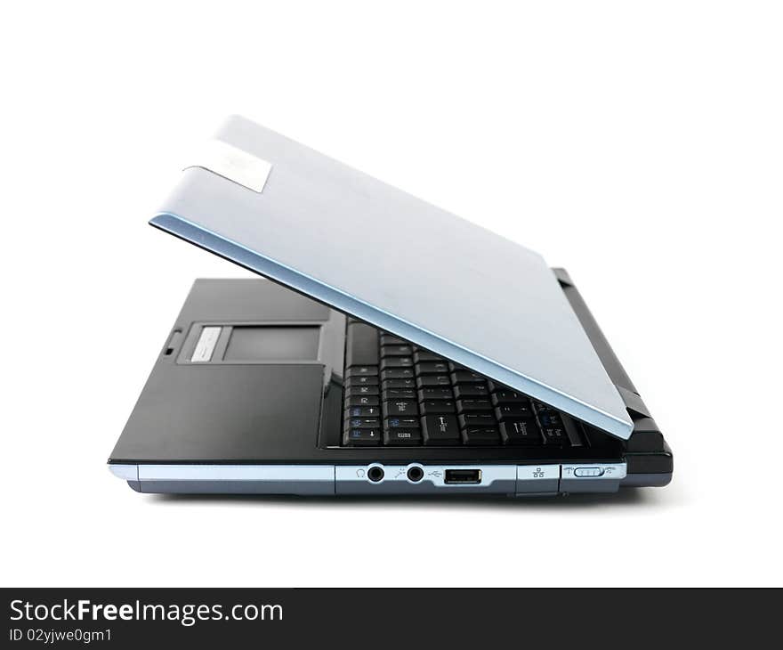 A laptop computer isolated against a white backgroun d