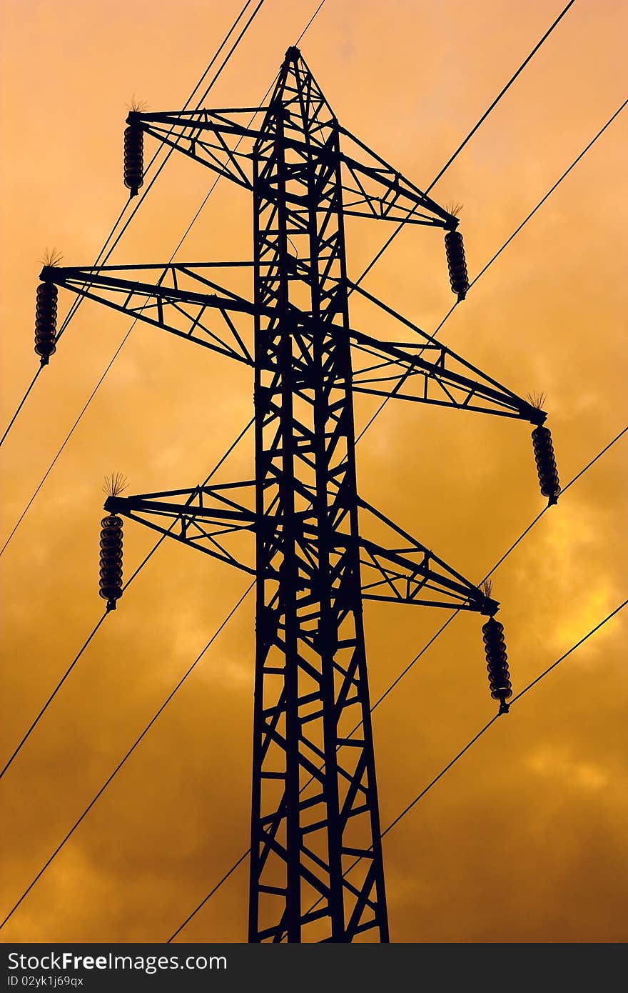 Power lines on the golden  sky. Power lines on the golden  sky