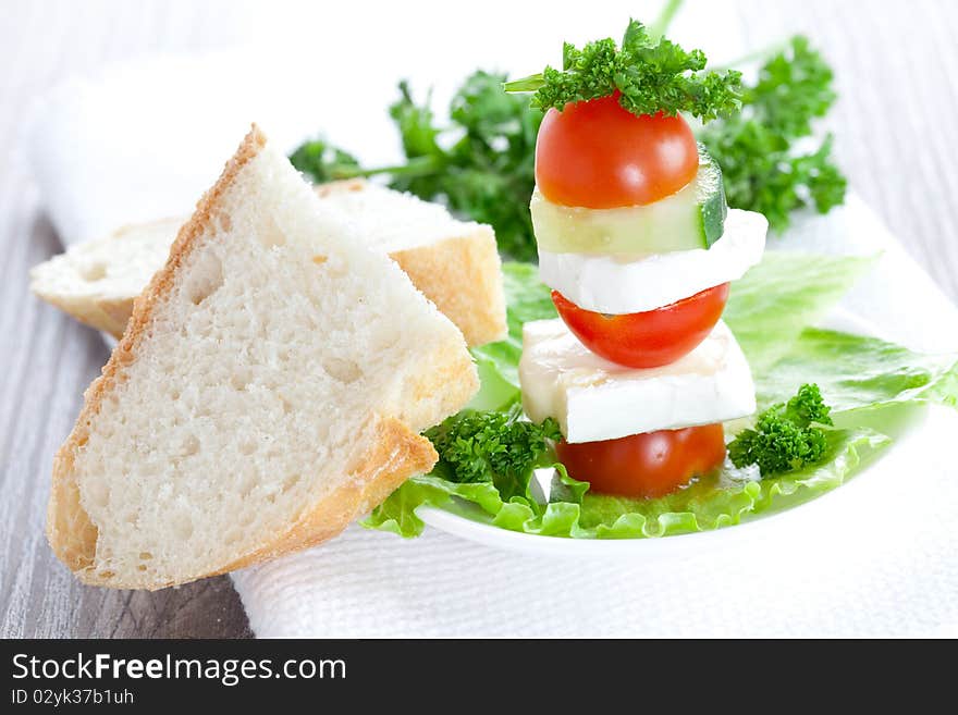 Antipasti with cheese and bread. Antipasti with cheese and bread