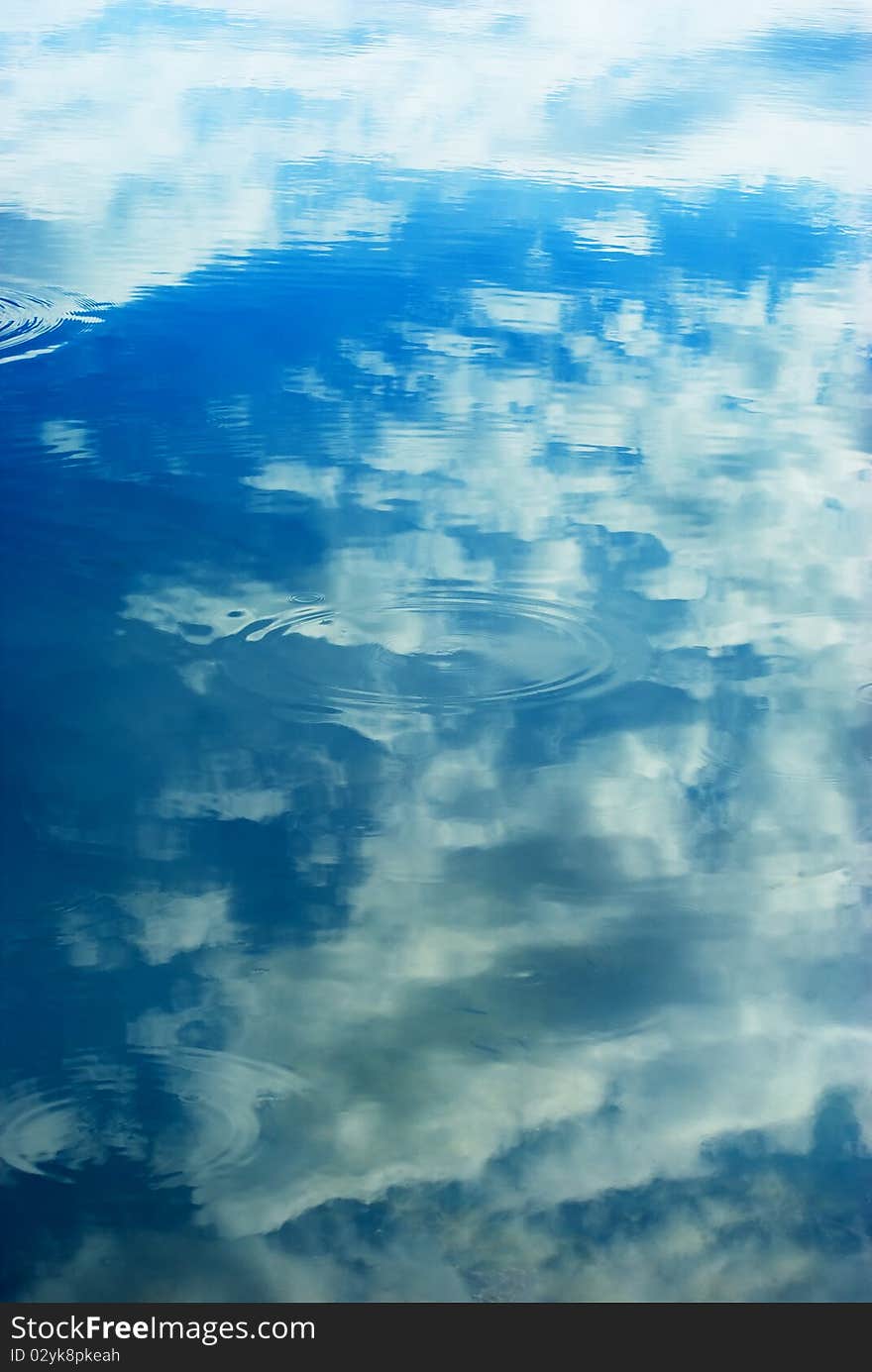 Clouds reflecting on the water. Clouds reflecting on the water