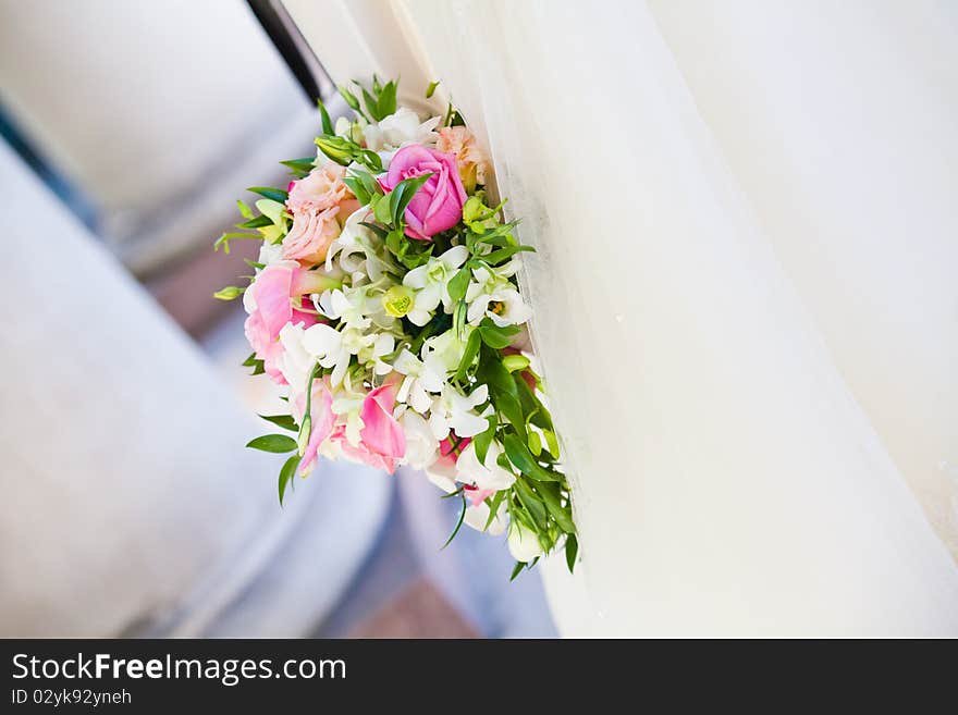 Bride holding her bridal bouquet. Close up. Bride holding her bridal bouquet. Close up