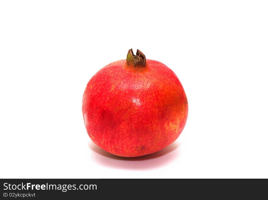 Photo of the pomegranate on white background