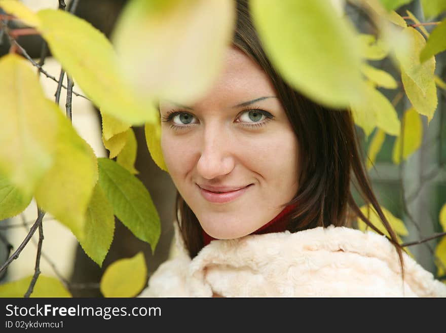 Autumn woman portrait on natural background. Autumn woman portrait on natural background