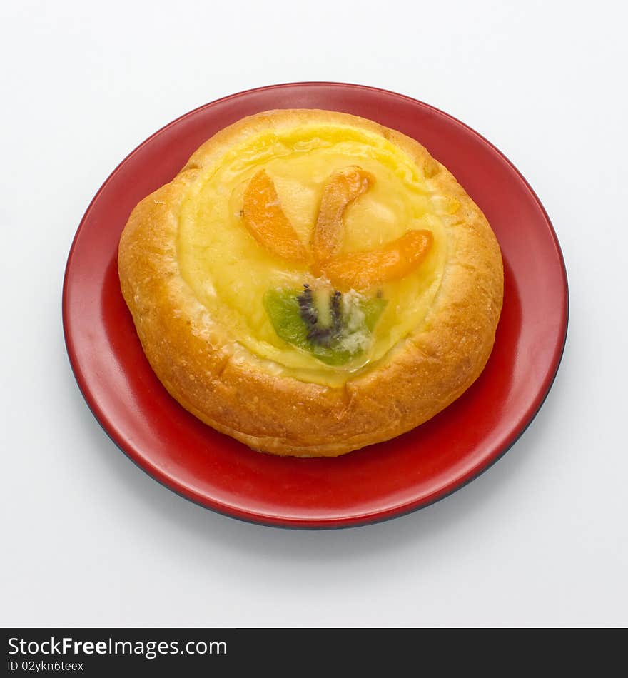 Cookie in a plate on a white background.