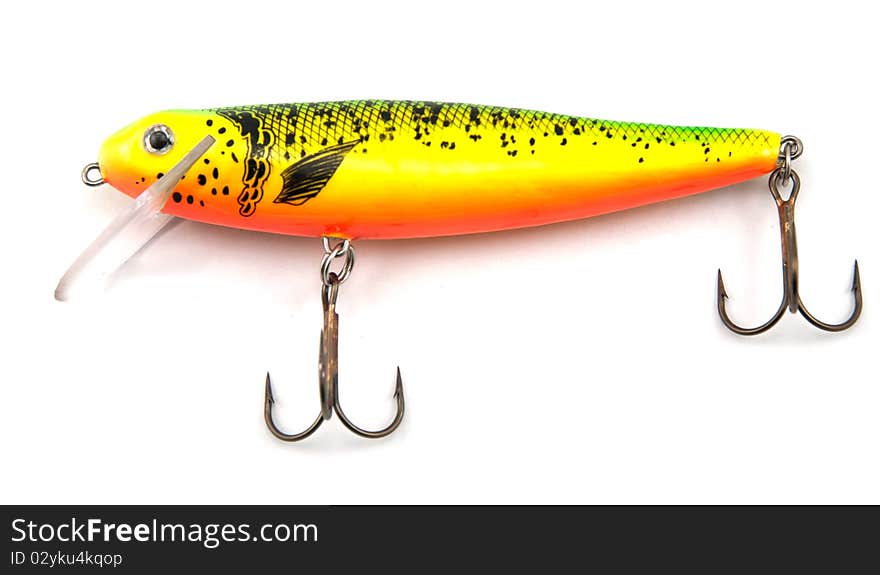 Studio shot of minnow shaped fishing lure isolated on white