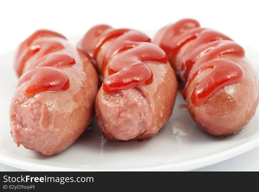 Sausages On A Plate