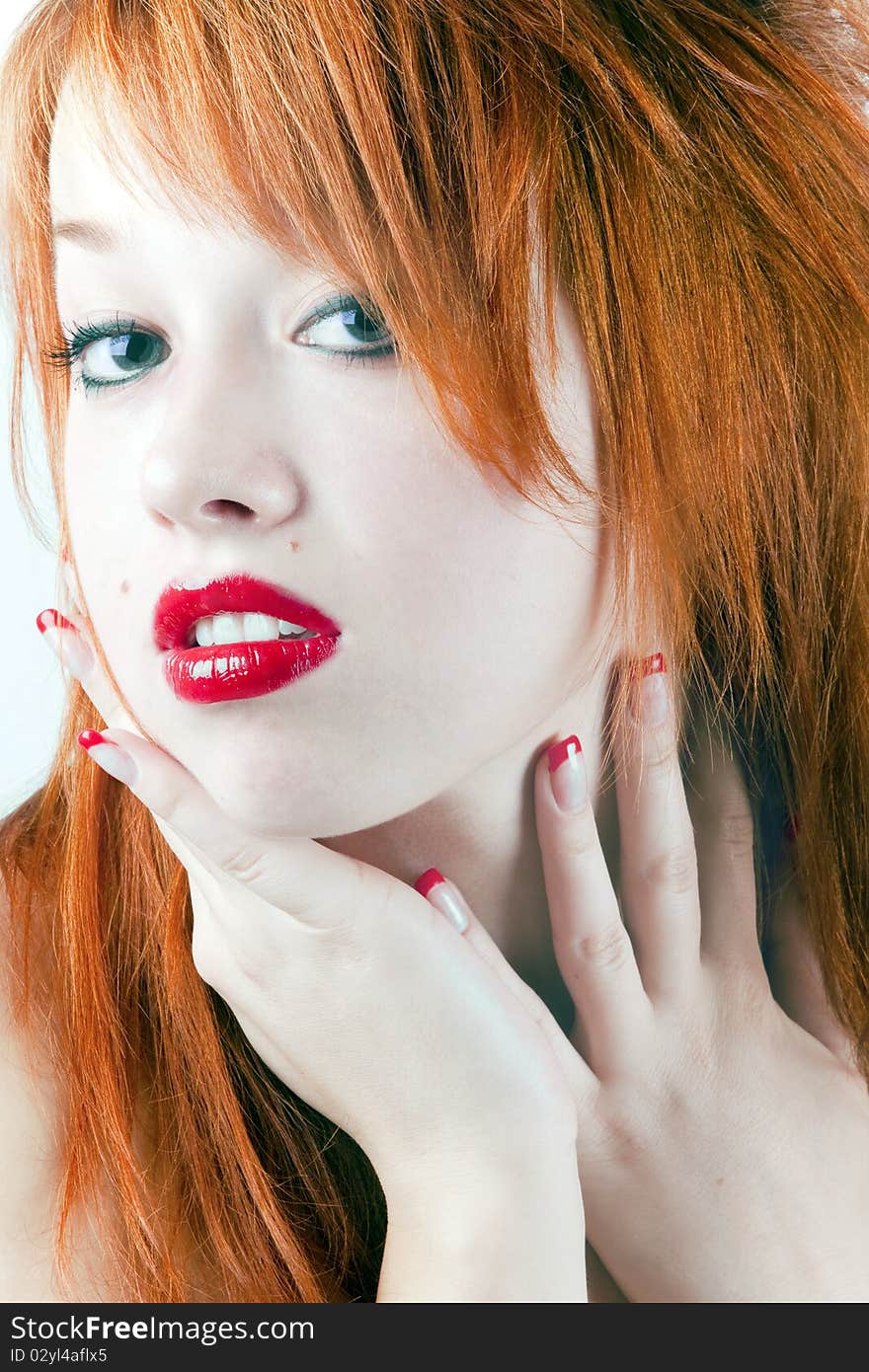 Portrait of a bright red girl with an interesting make-up