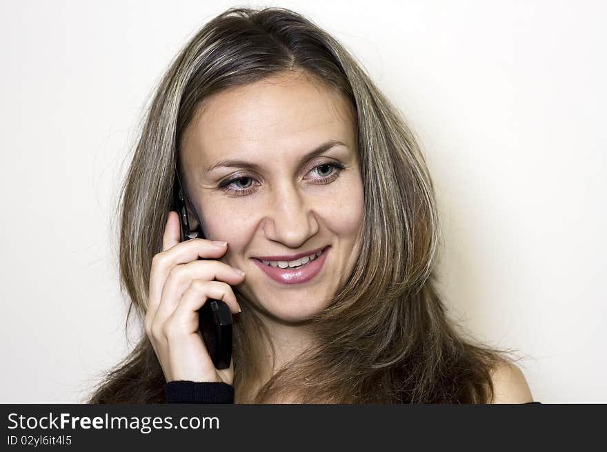 Business young woman on the phone. Business young woman on the phone