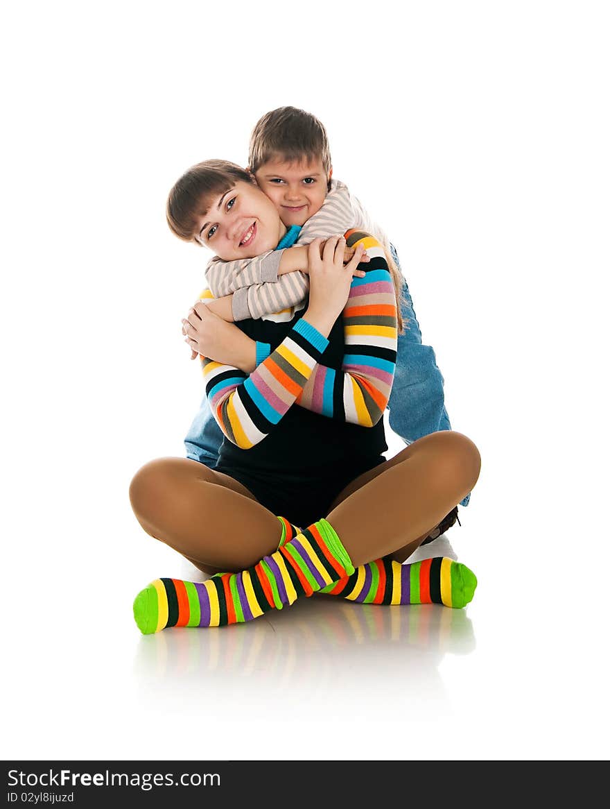 Smiling people. Mother and her son. Studio isolated