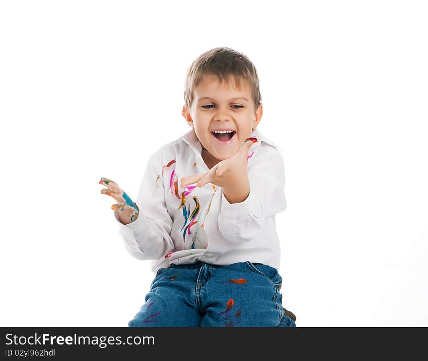 Adorable 3 year old boy covered in bright paint. Adorable 3 year old boy covered in bright paint.