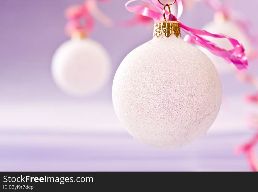 Holiday series:  Christmas decorated white ball withy ribbon. Holiday series:  Christmas decorated white ball withy ribbon